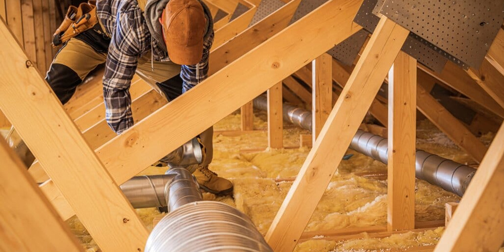 Image Of Employee Doing HVAC Maintenance